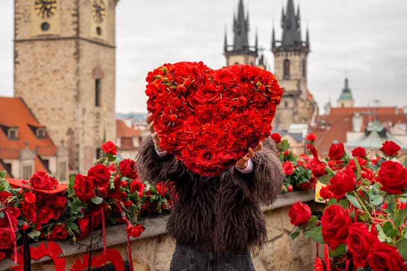 Valentine’s Insta spot in Prague – heart prop at Terasa U Prince with iconic Prague skyline view